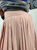 La soft pink skirt