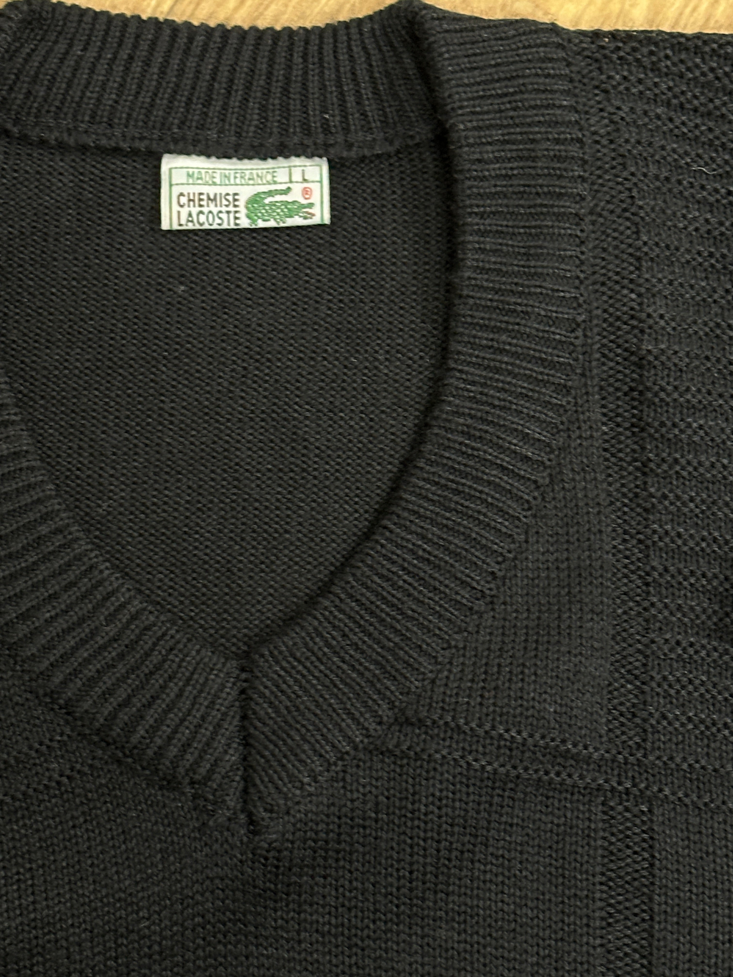 Black Lacoste sweater